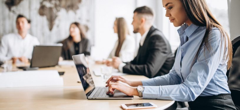 Group of people working out business plan in an office